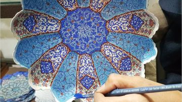فن مینا فی إیران 